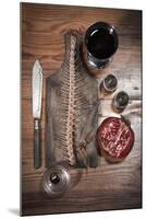 A Still Life Featuring a Fish Skeleton, Pomegranate and Red Wine-Komar-Mounted Photographic Print