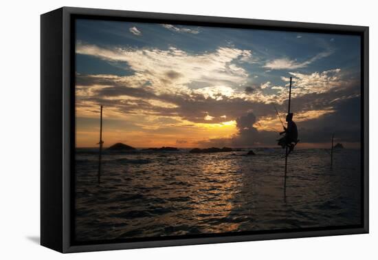 A Stilt Fisherman at Sunset-Alex Saberi-Framed Stretched Canvas
