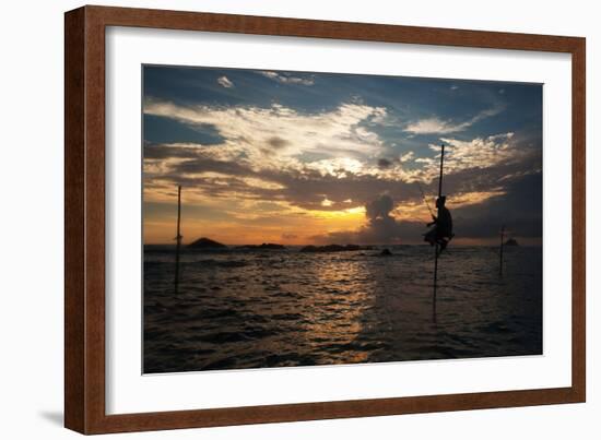 A Stilt Fisherman at Sunset-Alex Saberi-Framed Photographic Print