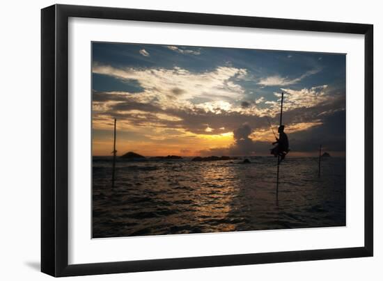 A Stilt Fisherman at Sunset-Alex Saberi-Framed Photographic Print