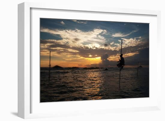 A Stilt Fisherman at Sunset-Alex Saberi-Framed Photographic Print