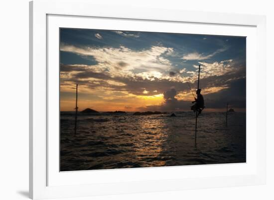 A Stilt Fisherman at Sunset-Alex Saberi-Framed Photographic Print