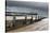 A stormy sky over the beach and pier at Cromer, Norfolk, England, United Kingdom, Europe-Jon Gibbs-Stretched Canvas