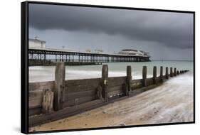 A stormy sky over the beach and pier at Cromer, Norfolk, England, United Kingdom, Europe-Jon Gibbs-Framed Stretched Canvas
