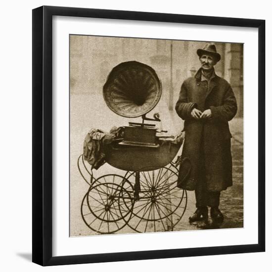 A Street Hawker Entertains with a Gramophone, Transported in a Pram-null-Framed Giclee Print