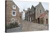 A Street in Crail with Lobster Pots, Fife Coast, Scotland, United Kingdom-Nick Servian-Stretched Canvas