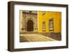 A Street in Tavira Leading to the Entrance of a Church.-Julianne Eggers-Framed Photographic Print