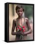 A Street Urchin, Name Unknown, Waits in Line Outside St. Thomas' Church with a Bouquet of Flowers-null-Framed Stretched Canvas