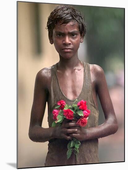 A Street Urchin, Name Unknown, Waits in Line Outside St. Thomas' Church with a Bouquet of Flowers-null-Mounted Photographic Print