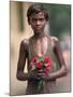 A Street Urchin, Name Unknown, Waits in Line Outside St. Thomas' Church with a Bouquet of Flowers-null-Mounted Photographic Print