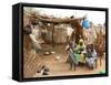 A Sudanese Family is Seen Inside Their Thatched Hut During the Visit of Unicef Goodwill Ambassador-null-Framed Stretched Canvas