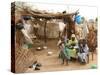 A Sudanese Family is Seen Inside Their Thatched Hut During the Visit of Unicef Goodwill Ambassador-null-Stretched Canvas