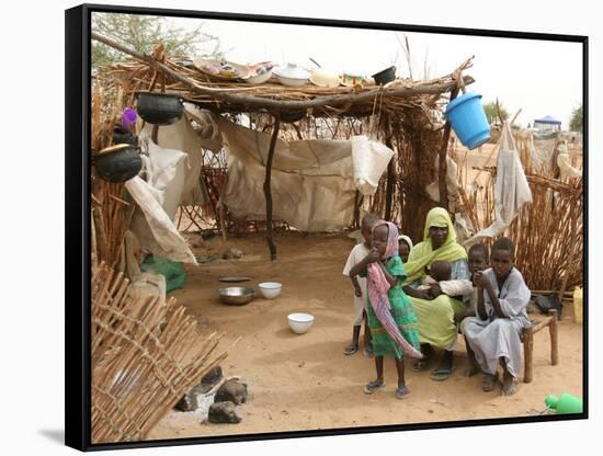 A Sudanese Family is Seen Inside Their Thatched Hut During the Visit of Unicef Goodwill Ambassador-null-Framed Stretched Canvas