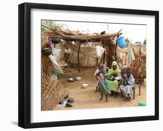 A Sudanese Family is Seen Inside Their Thatched Hut During the Visit of Unicef Goodwill Ambassador-null-Framed Premium Photographic Print