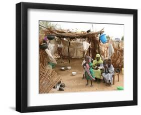 A Sudanese Family is Seen Inside Their Thatched Hut During the Visit of Unicef Goodwill Ambassador-null-Framed Photographic Print