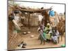 A Sudanese Family is Seen Inside Their Thatched Hut During the Visit of Unicef Goodwill Ambassador-null-Mounted Photographic Print