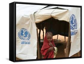 A Sudanese School Girl Stands Infront of Her Class Room-null-Framed Stretched Canvas