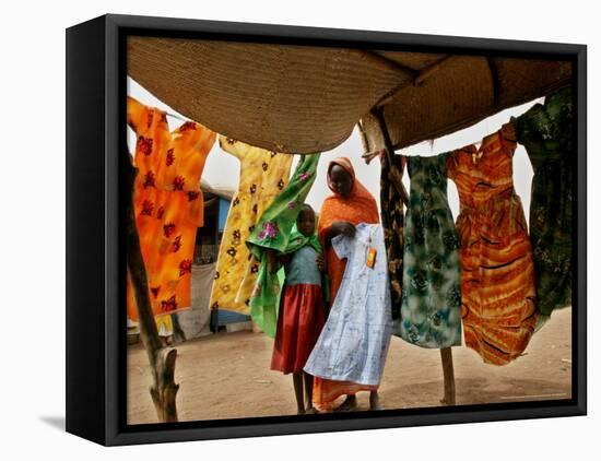 A Sudanese Woman Buys a Dress for Her Daughter at the Zamzam Refugee Camp-Nasser Nasser-Framed Stretched Canvas