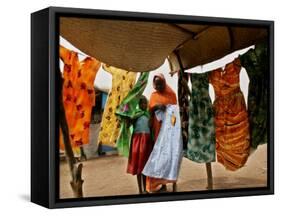 A Sudanese Woman Buys a Dress for Her Daughter at the Zamzam Refugee Camp-Nasser Nasser-Framed Stretched Canvas