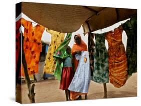 A Sudanese Woman Buys a Dress for Her Daughter at the Zamzam Refugee Camp-Nasser Nasser-Stretched Canvas