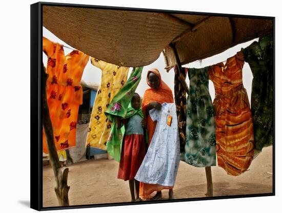 A Sudanese Woman Buys a Dress for Her Daughter at the Zamzam Refugee Camp-null-Framed Stretched Canvas