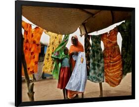 A Sudanese Woman Buys a Dress for Her Daughter at the Zamzam Refugee Camp-null-Framed Photographic Print