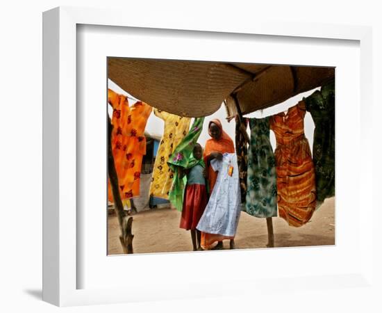 A Sudanese Woman Buys a Dress for Her Daughter at the Zamzam Refugee Camp-null-Framed Photographic Print