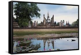 A Sukhothai Era Buddha at Wat Mahathat, Sukhothai Historical Park, Thailand-Alex Robinson-Framed Stretched Canvas