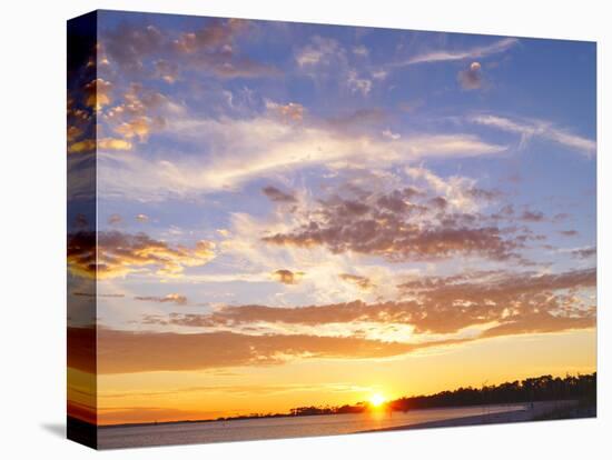 A Sunset in a Beach in Pensacola, Florida, Usa. the Sunset Painting the Sky and Cloud Patterns, Wit-Banilar-Stretched Canvas