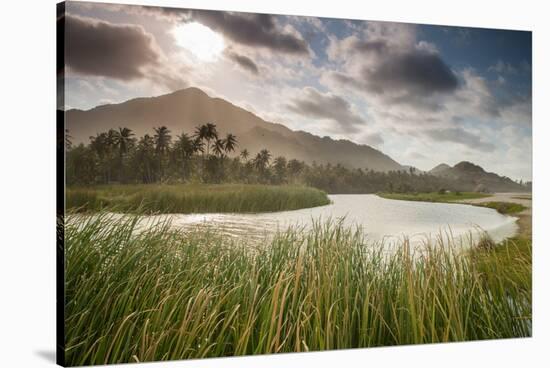 A sunset scene in Arrecifes beach, Tayrona national park, Colombia.-Alex Saberi-Stretched Canvas