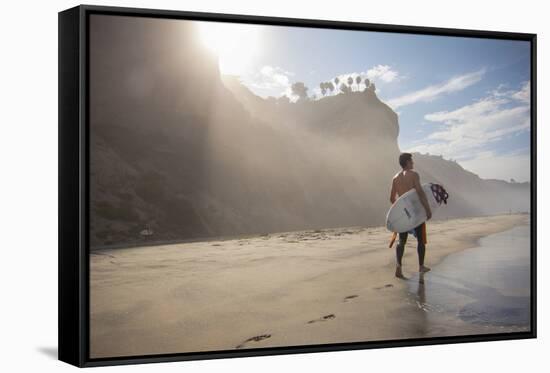 A Surfer at Black's Beach Near from the Torrey Pines State Reserve in San Diego, California-Carlo Acenas-Framed Stretched Canvas