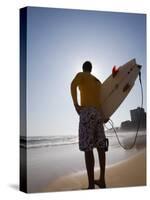 A Surfer Looks Out to the Waves at Manly Beach on Sydney's North Shore, Australia-Andrew Watson-Stretched Canvas