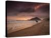 A Surfer Makes His Way Out of the Water at Praia Itamambuca in Ubatuba, Brazil-Alex Saberi-Stretched Canvas