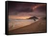 A Surfer Makes His Way Out of the Water at Praia Itamambuca in Ubatuba, Brazil-Alex Saberi-Framed Stretched Canvas