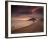 A Surfer Makes His Way Out of the Water at Praia Itamambuca in Ubatuba, Brazil-Alex Saberi-Framed Photographic Print