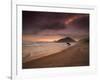 A Surfer Makes His Way Out of the Water at Praia Itamambuca in Ubatuba, Brazil-Alex Saberi-Framed Photographic Print