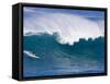 A Surfer Rides a Wave at Waimea Beach-null-Framed Stretched Canvas