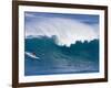 A Surfer Rides a Wave at Waimea Beach-null-Framed Photographic Print