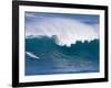 A Surfer Rides a Wave at Waimea Beach-null-Framed Photographic Print