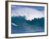 A Surfer Rides a Wave at Waimea Beach-null-Framed Photographic Print