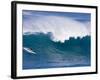 A Surfer Rides a Wave at Waimea Beach-null-Framed Photographic Print