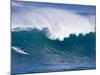 A Surfer Rides a Wave at Waimea Beach-null-Mounted Photographic Print