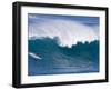 A Surfer Rides a Wave at Waimea Beach-null-Framed Photographic Print