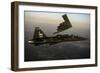 A T-38 Talon Flies in Formation with a B-2 Spirit-null-Framed Photographic Print