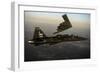 A T-38 Talon Flies in Formation with a B-2 Spirit-null-Framed Photographic Print