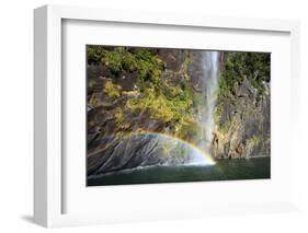 A Tall Waterfall Drops Off a Steep Cliff into Waters, Milford Sound on South Island, New Zealand-Paul Dymond-Framed Photographic Print