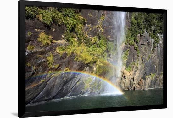 A Tall Waterfall Drops Off a Steep Cliff into Waters, Milford Sound on South Island, New Zealand-Paul Dymond-Framed Photographic Print