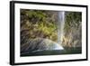 A Tall Waterfall Drops Off a Steep Cliff into Waters, Milford Sound on South Island, New Zealand-Paul Dymond-Framed Photographic Print