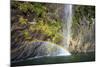 A Tall Waterfall Drops Off a Steep Cliff into Waters, Milford Sound on South Island, New Zealand-Paul Dymond-Mounted Photographic Print