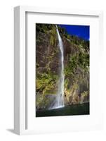 A Tall Waterfall Drops Off a Steep Cliff into Waters, Milford Sound on South Island, New Zealand-Paul Dymond-Framed Photographic Print